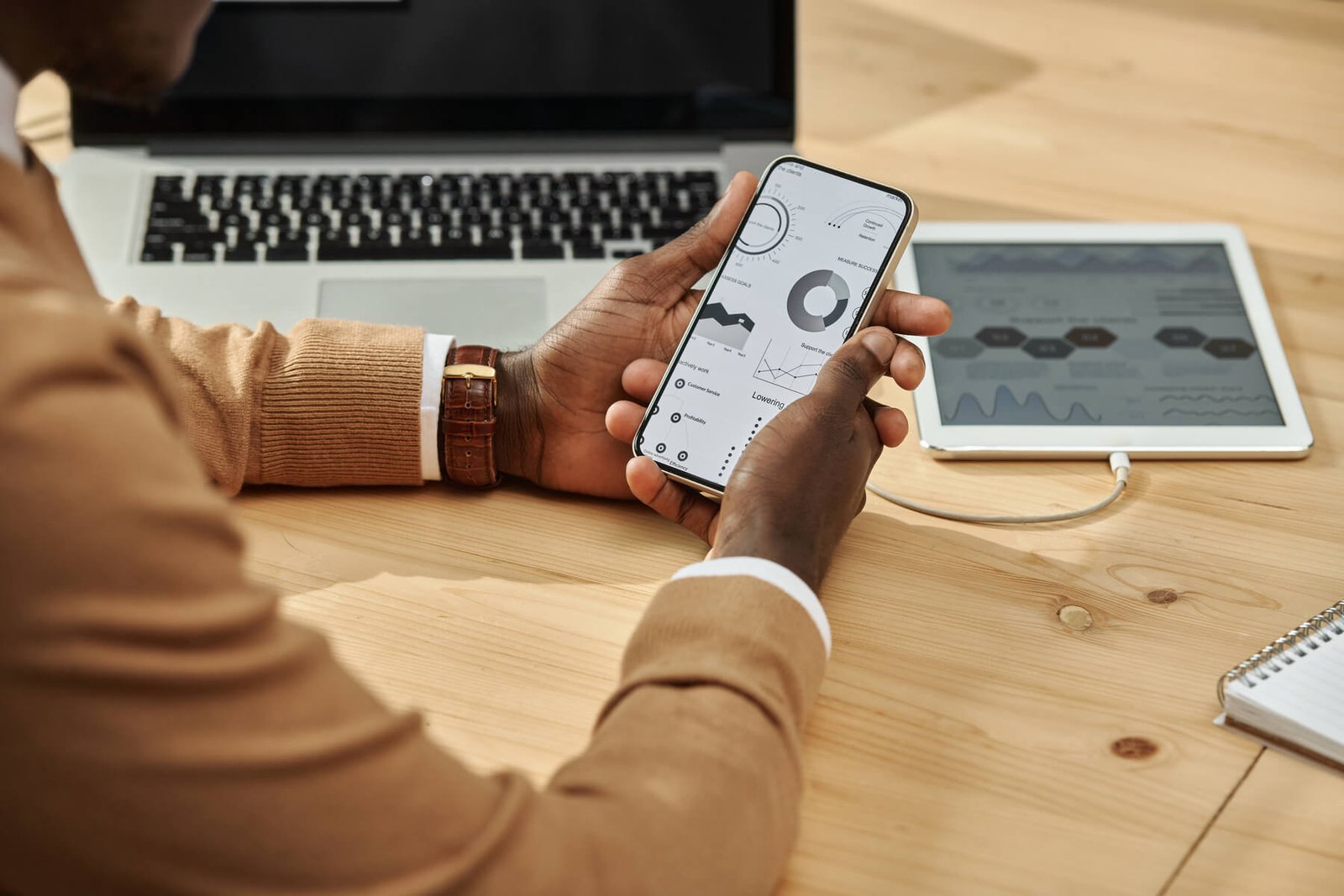 businessman-working-with-financial-charts-on-smart-2023-11-27-05-05-50-utc